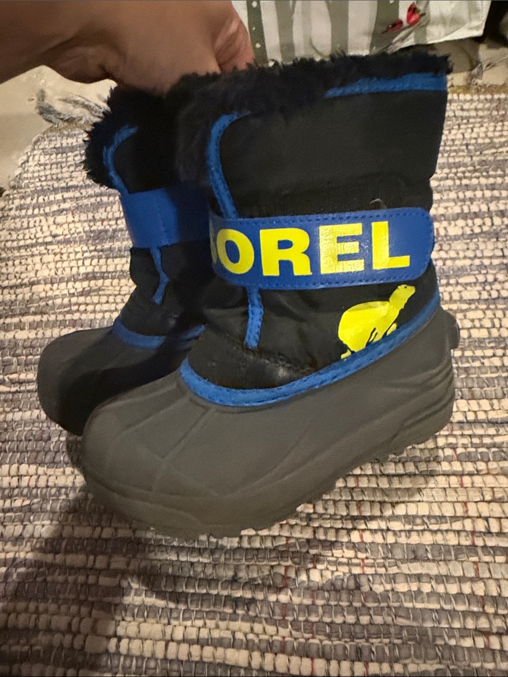 Sorel Kids Black Boots with Blue and Yellow Accents